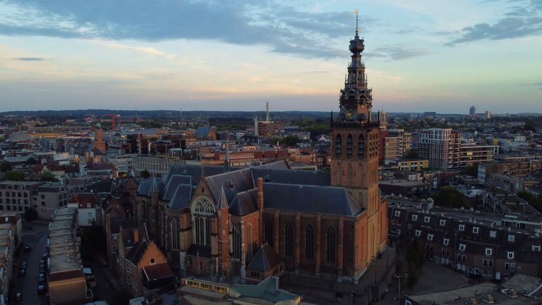 Aerial view of Saint Stephen's Church in Nijmegen at sunset.